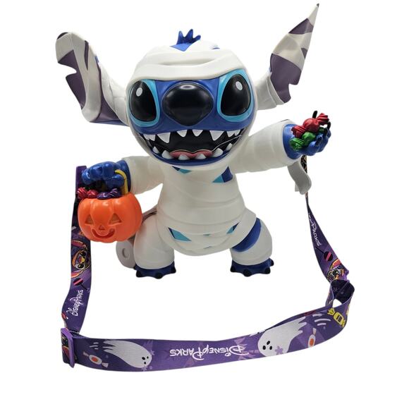Disney Parks Glow-in-the-Dark Stitch Mummy with Light-up Pumpkin Popcorn Bucket - Picture 1 of 15